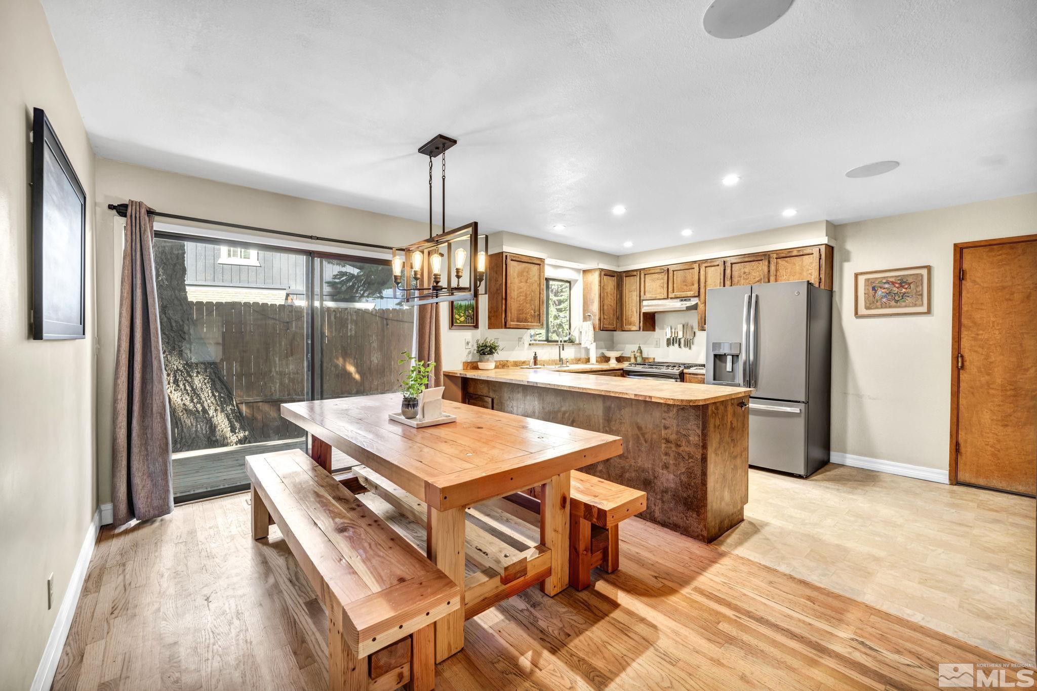 445 Andria Drive Stateline, NV 89449 - Photo 11 of 36 a large kitchen with a table and chairs