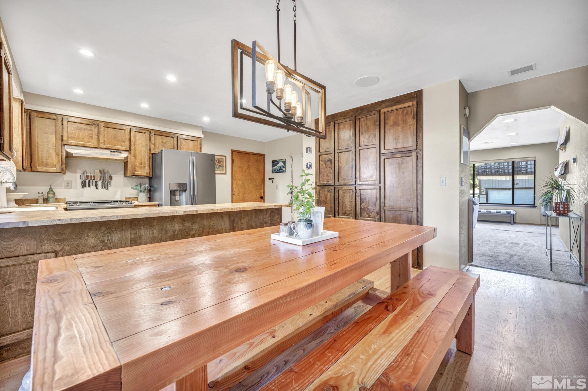 445 Andria Drive Stateline, NV 89449 - Photo 12 of 36 a lobby with chandelier and wooden floor