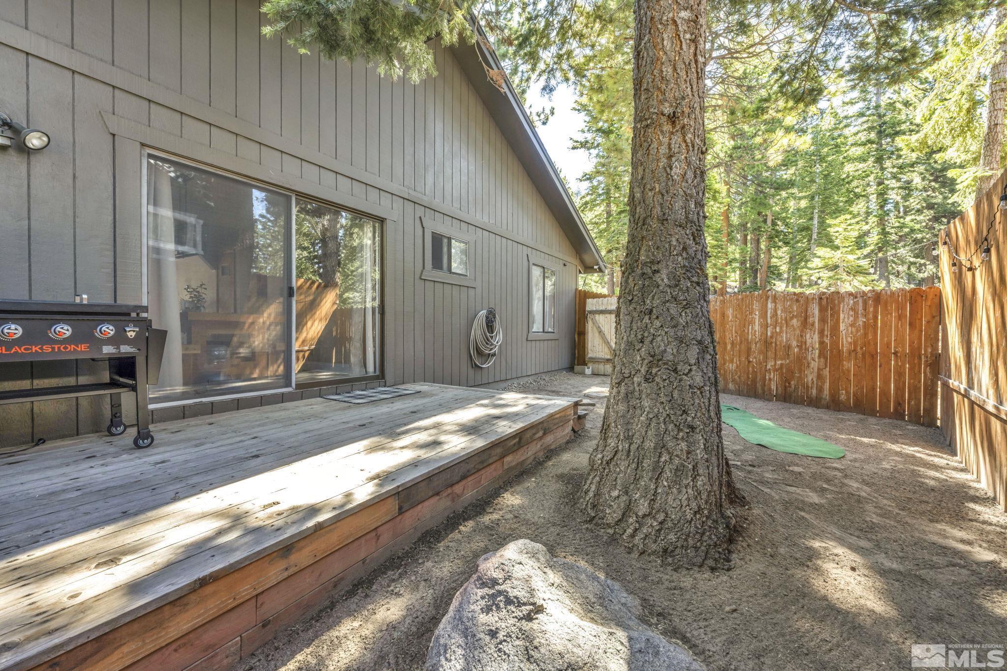 445 Andria Drive Stateline, NV 89449 - Photo 17 of 36 a view of a house with backyard and sitting area
