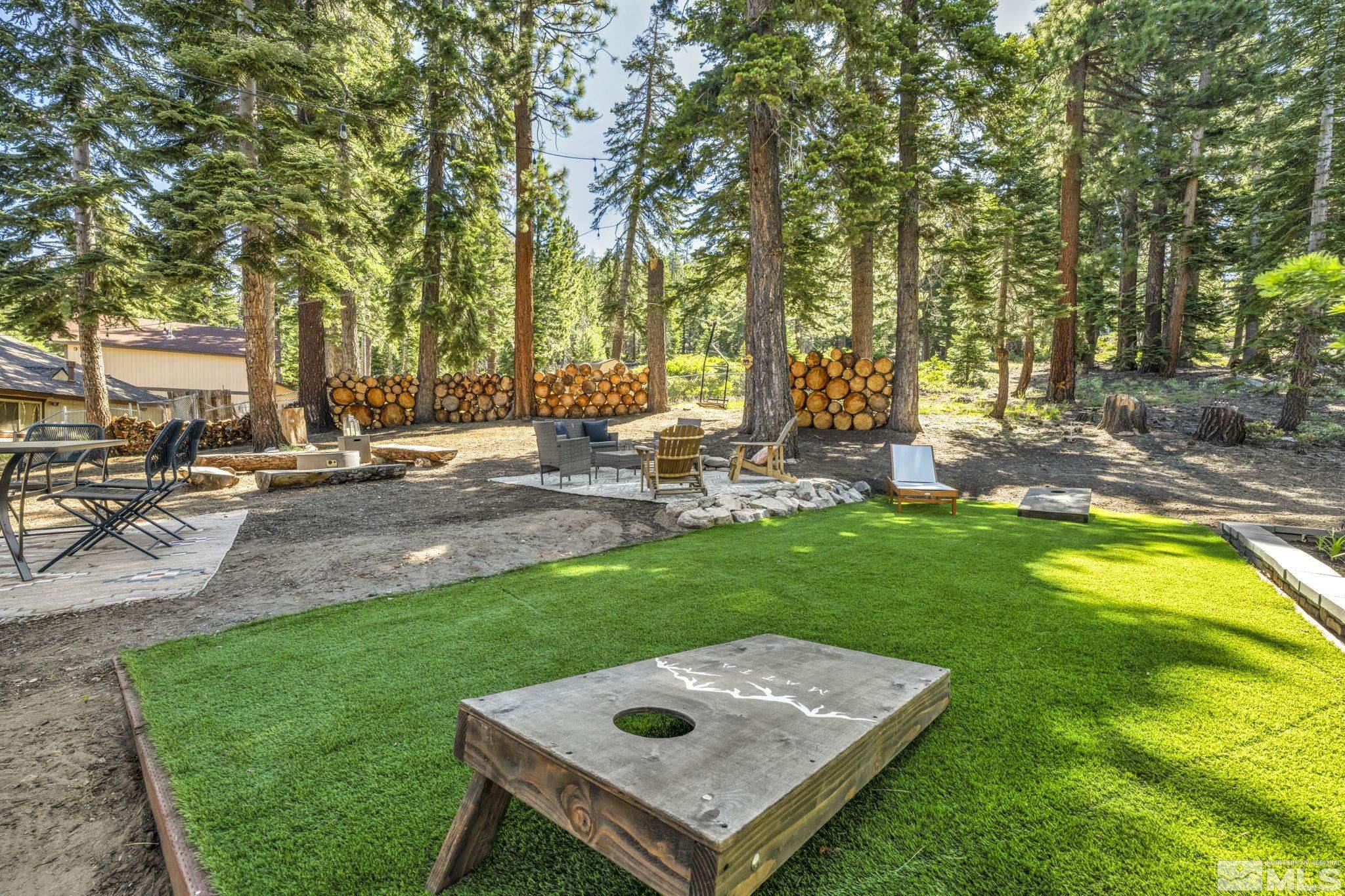 445 Andria Drive Stateline, NV 89449 - Photo 3 of 36 a view of a backyard with sitting area