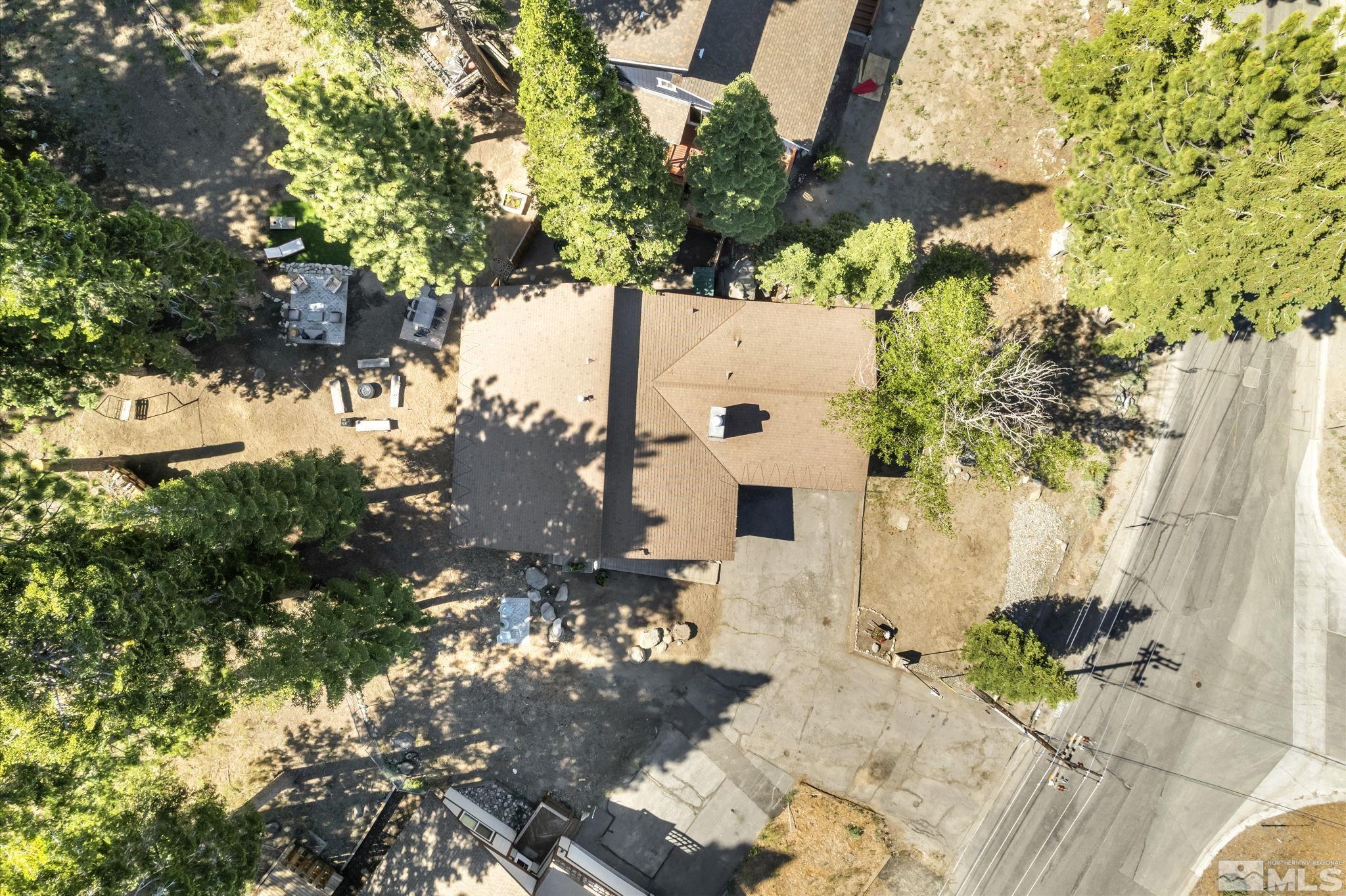 445 Andria Drive Stateline, NV 89449 - Photo 31 of 36 a white house with a tree in the background