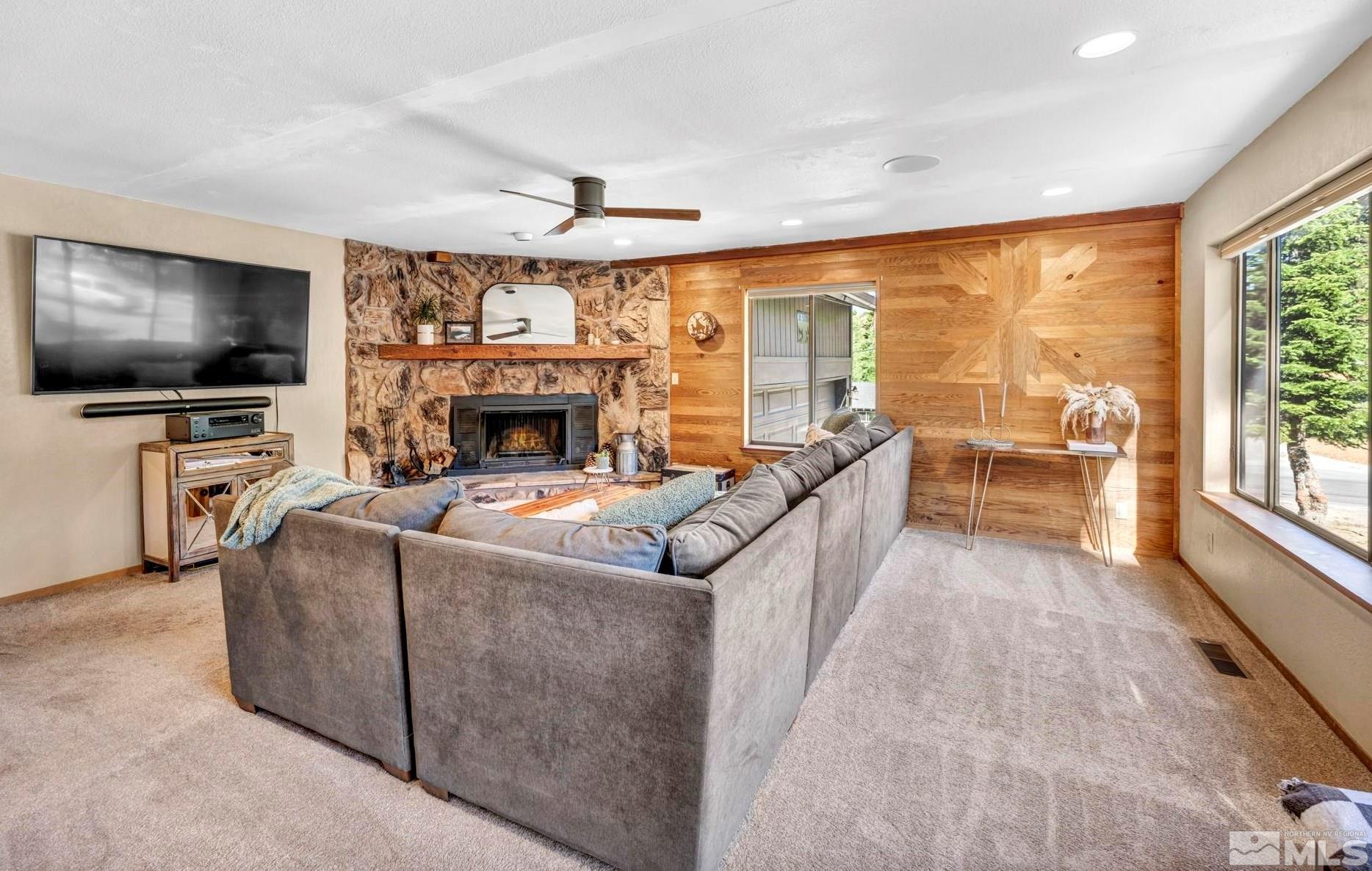 445 Andria Drive Stateline, NV 89449 - Photo 6 of 36 a living room with furniture and a flat screen tv