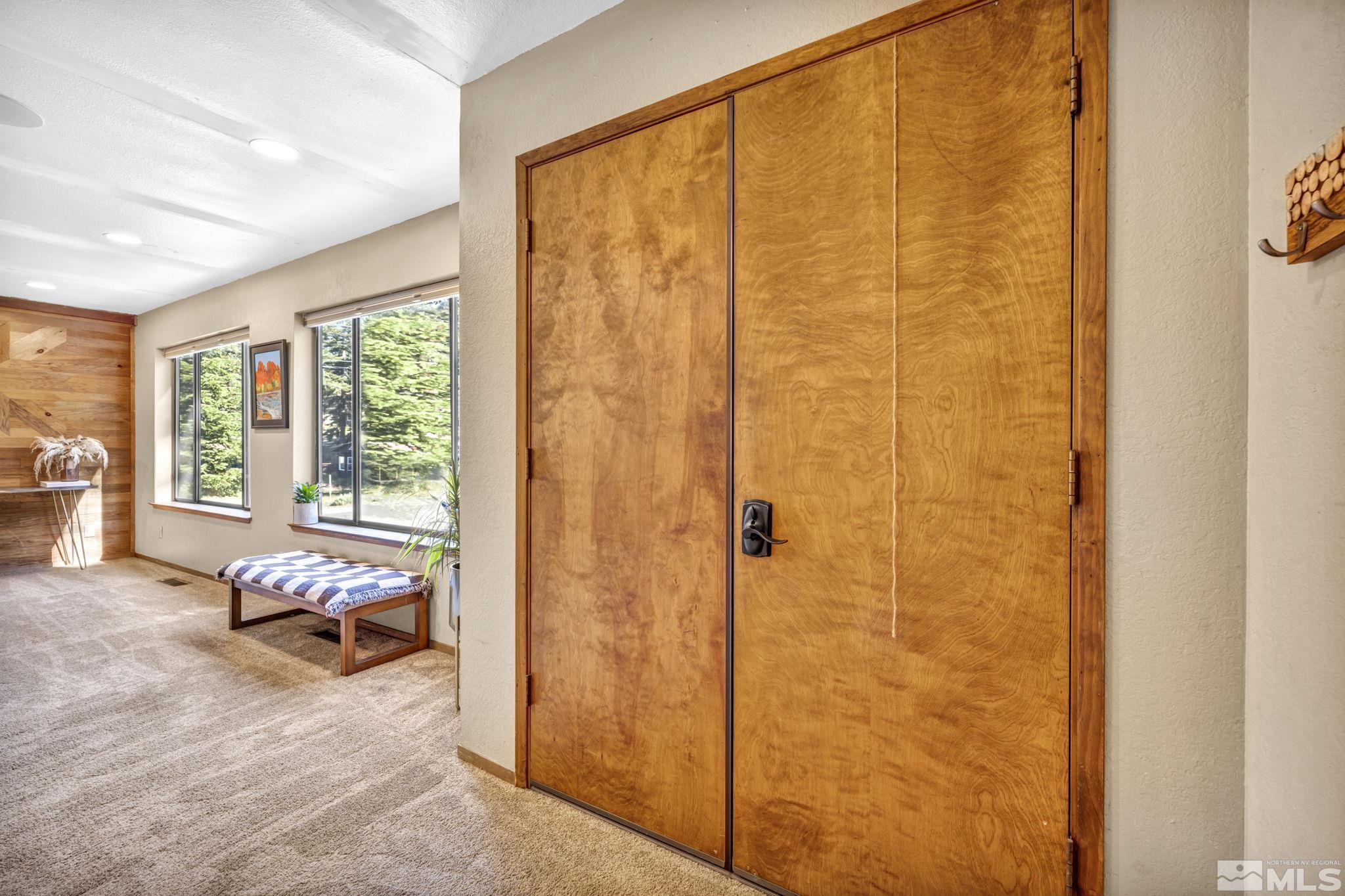 445 Andria Drive Stateline, NV 89449 - Photo 7 of 36 a bed room with a bed and a chair