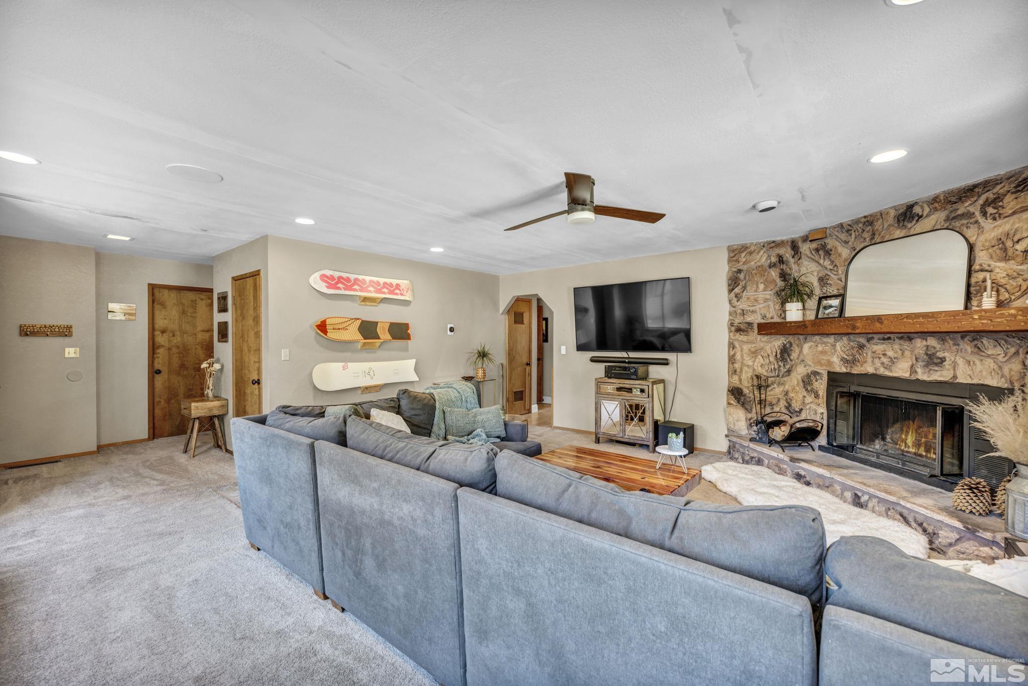 445 Andria Drive Stateline, NV 89449 - Photo 10 of 36 a living room with furniture and a fireplace