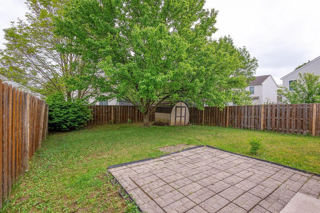 2100 Waymont Road Columbus, OH 43229 - Photo 7 of 15 Fenced in backyard with paver patio.