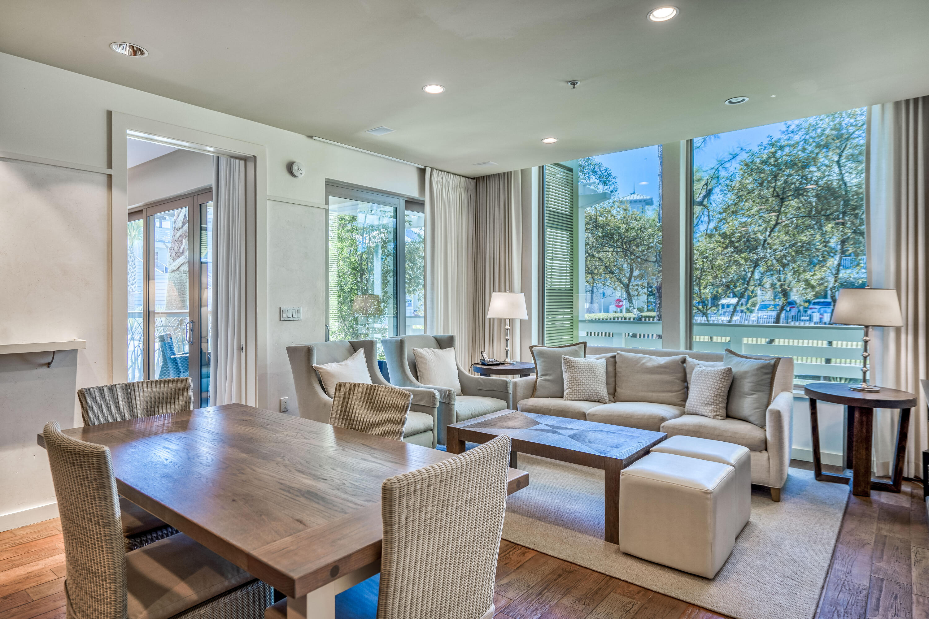 29 Goldenrod Circle, Unit 303/7 Santa Rosa Beach, FL 32459 - Photo 11 of 36 a living room with furniture and large windows
