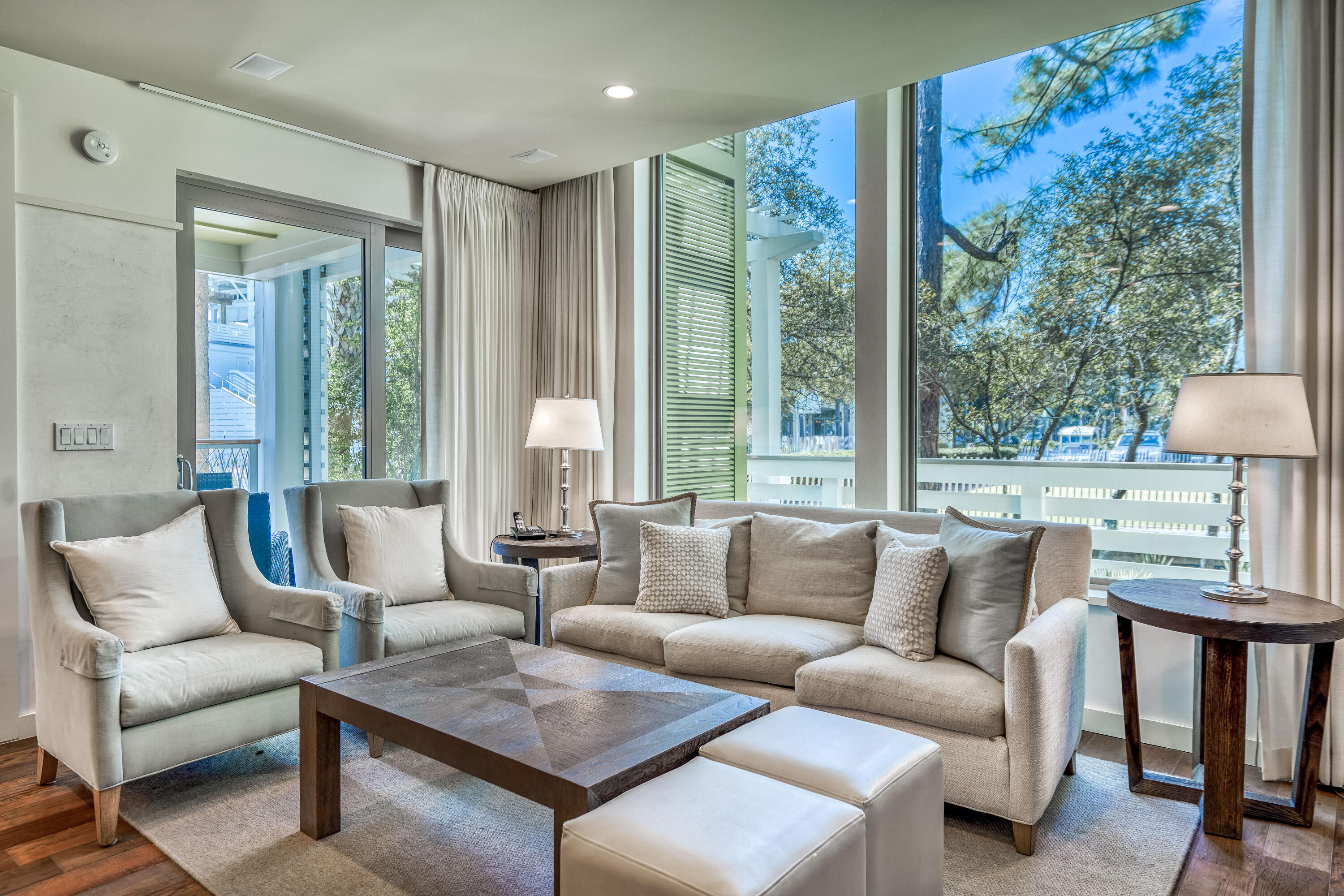 29 Goldenrod Circle, Unit 303/7 Santa Rosa Beach, FL 32459 - Photo 12 of 36 a living room with furniture and a large window