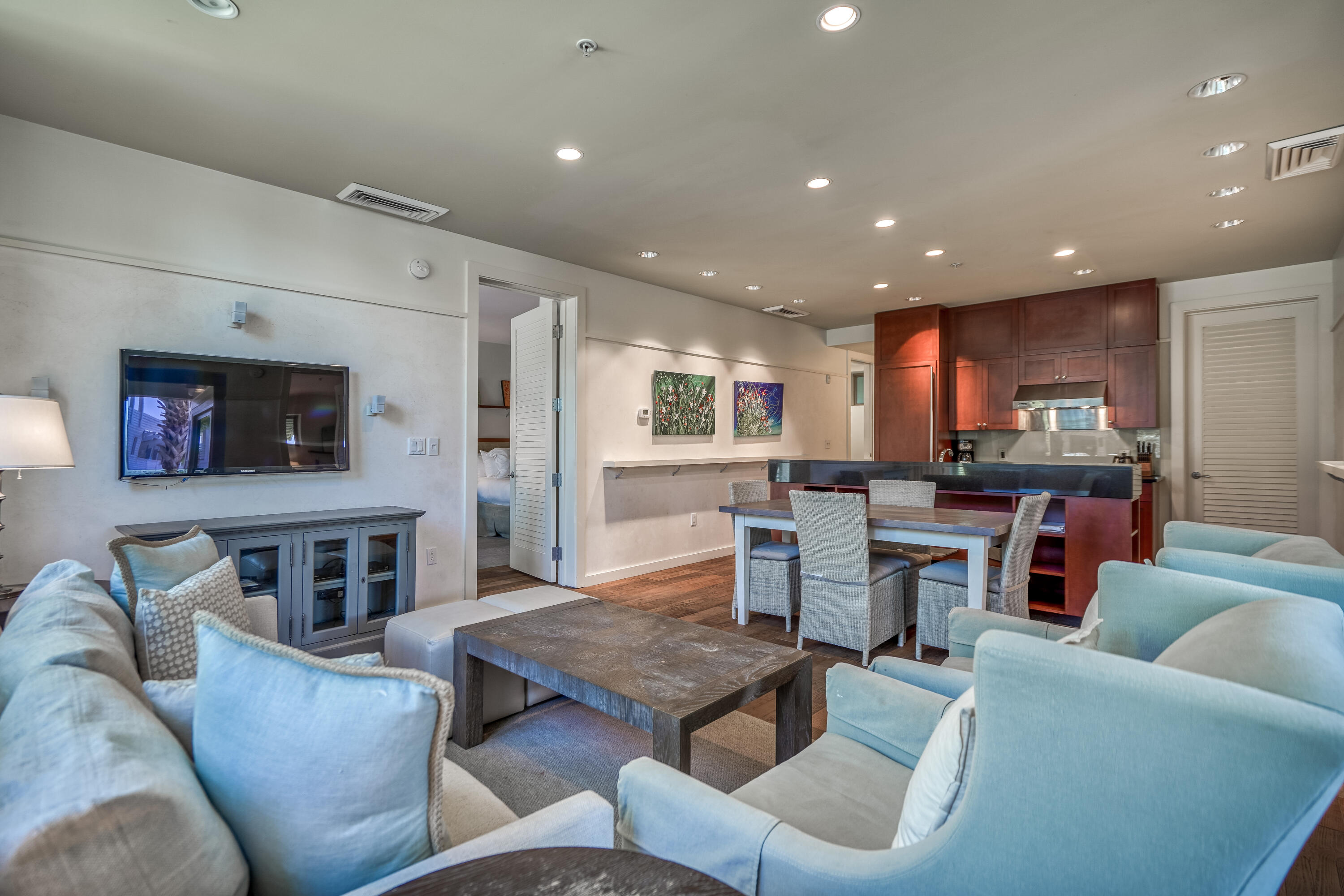 29 Goldenrod Circle, Unit 303/7 Santa Rosa Beach, FL 32459 - Photo 14 of 36 a living room with fireplace furniture and a flat screen tv