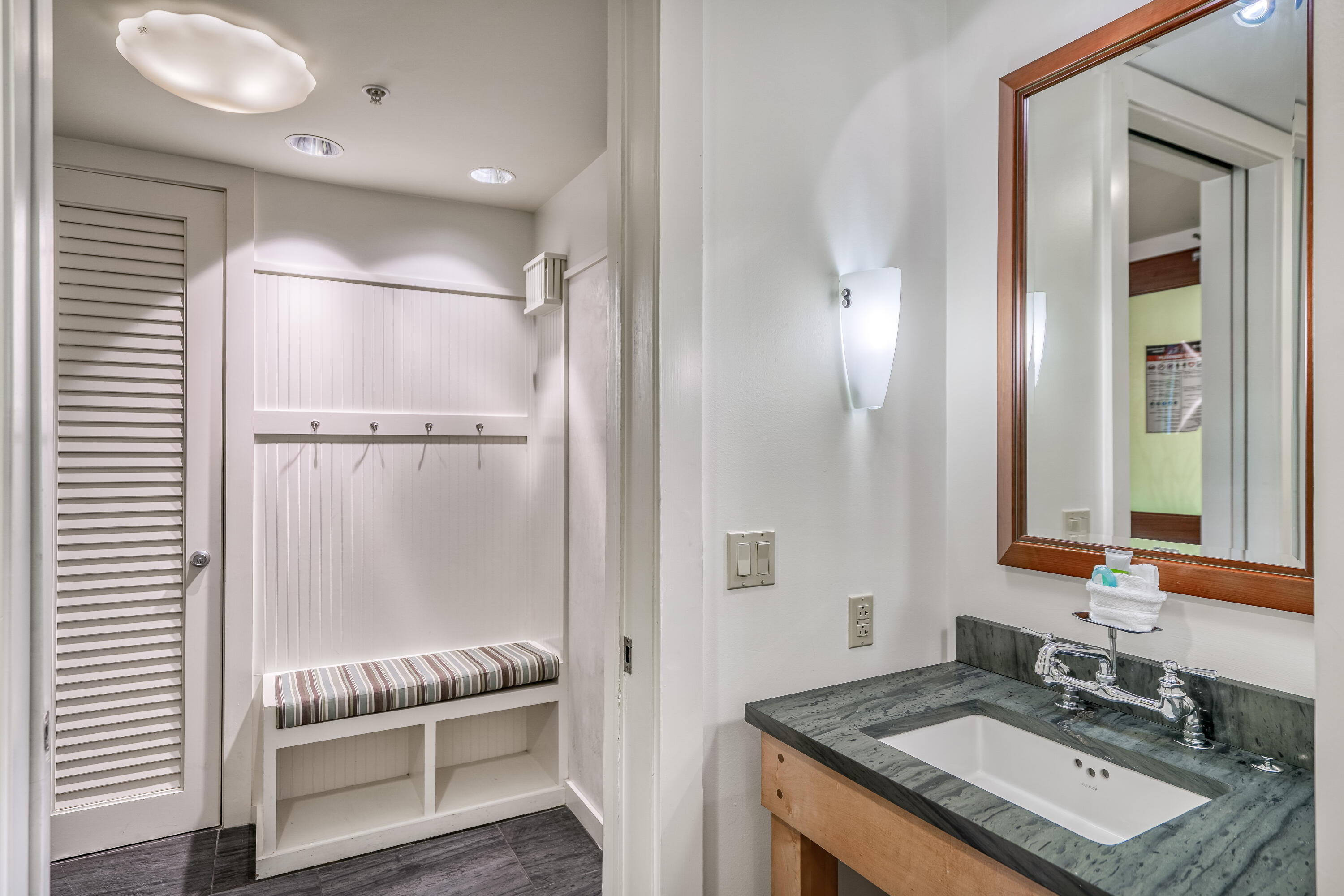 29 Goldenrod Circle, Unit 303/7 Santa Rosa Beach, FL 32459 - Photo 19 of 36 a bathroom with a sink and a mirror