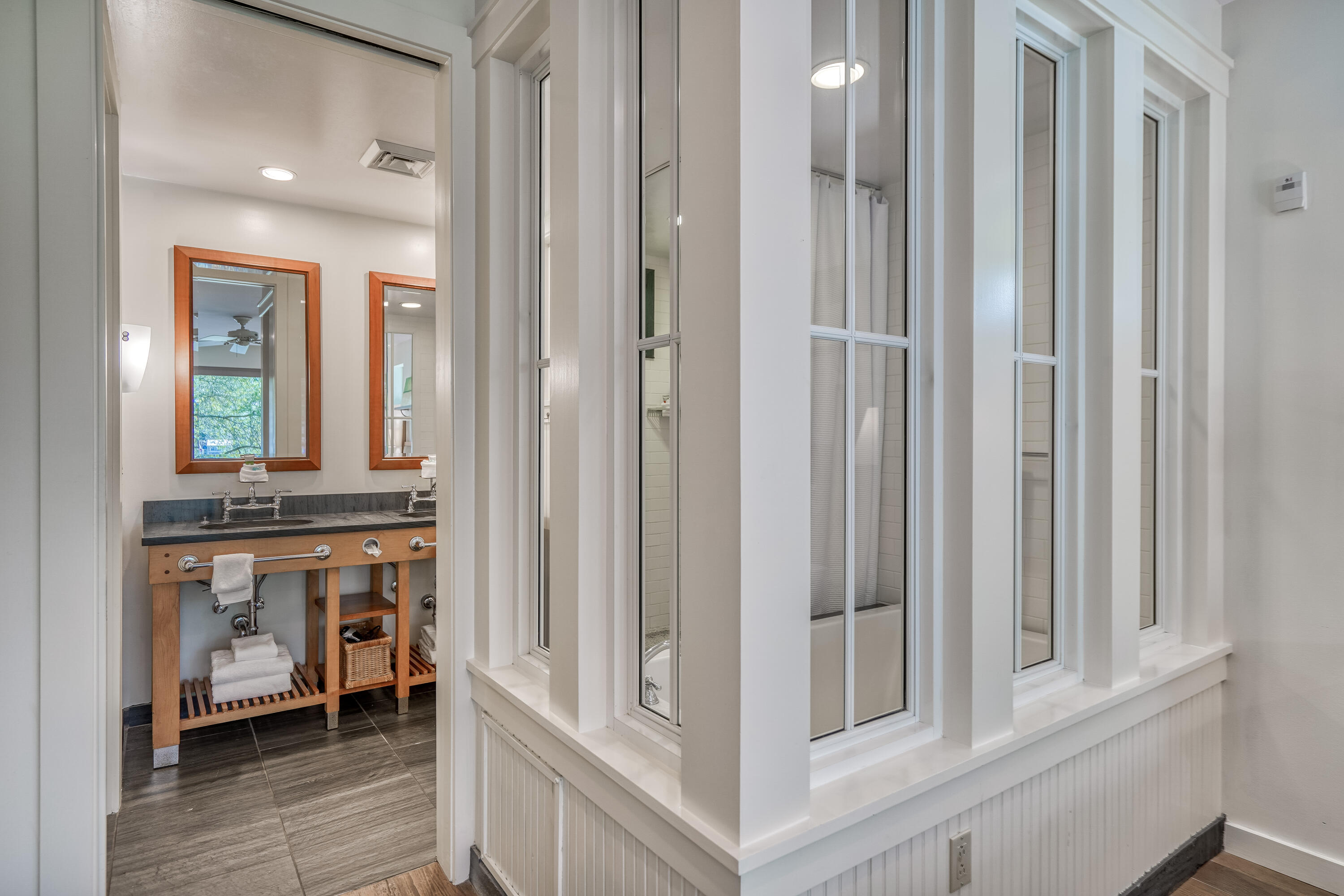 29 Goldenrod Circle, Unit 303/7 Santa Rosa Beach, FL 32459 - Photo 25 of 36 a bathroom with a sink and a mirror