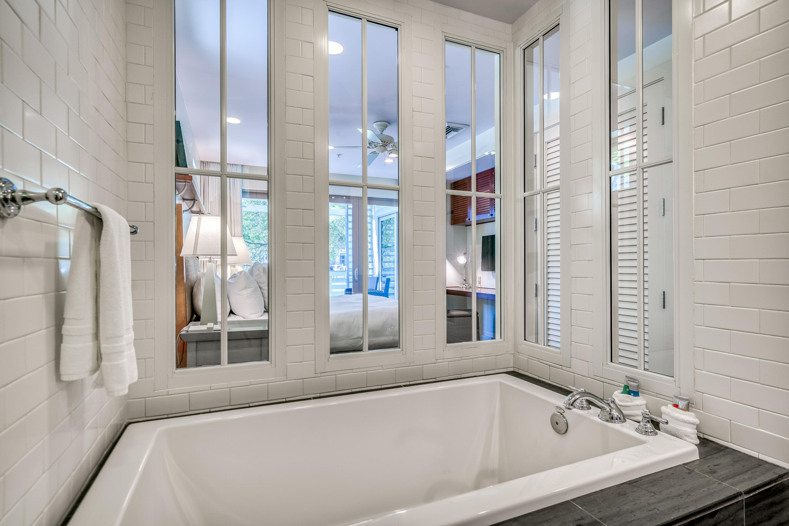29 Goldenrod Circle, Unit 303/7 Santa Rosa Beach, FL 32459 - Photo 28 of 36 a bathroom with a tub and a sink