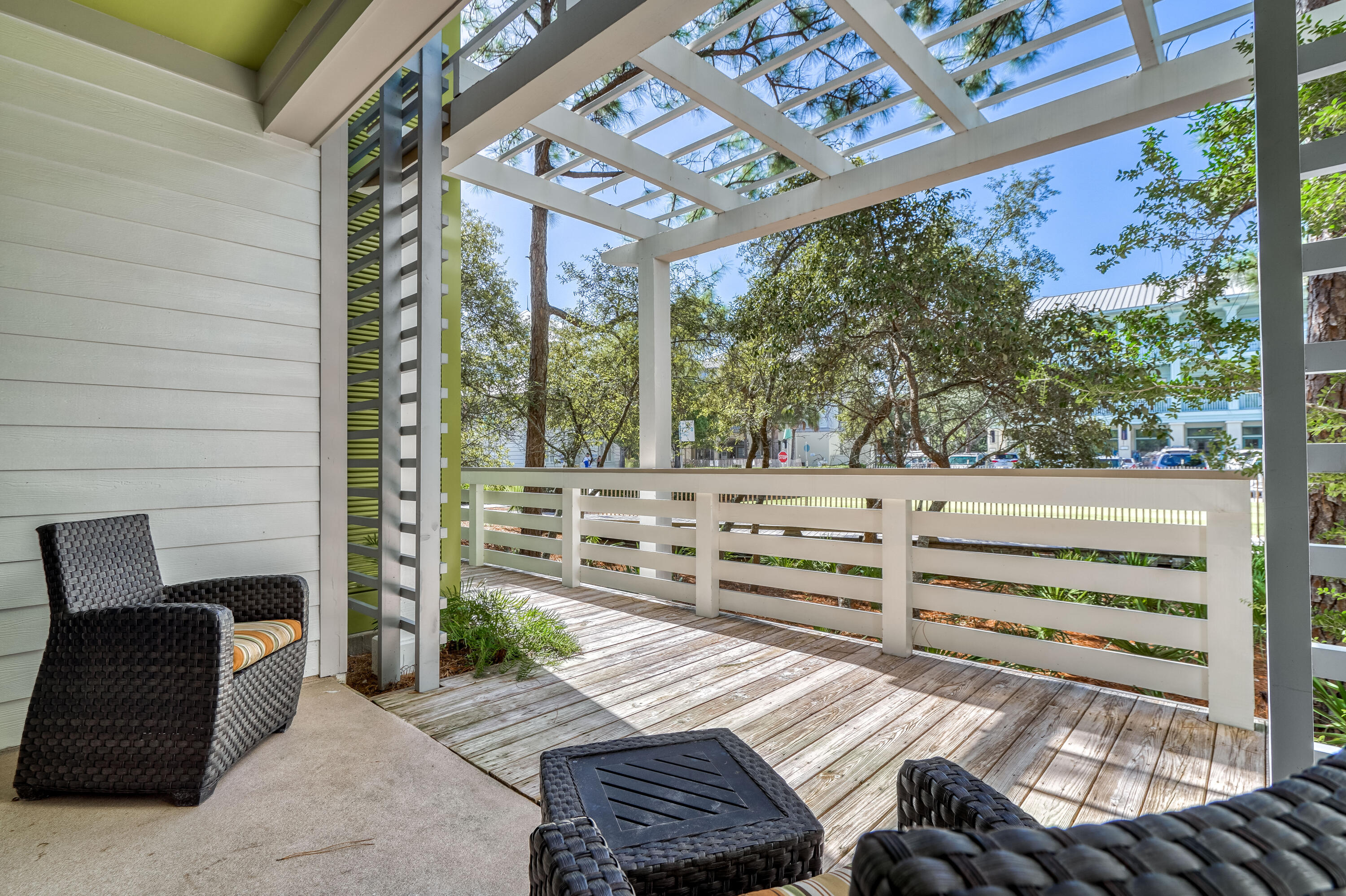 29 Goldenrod Circle, Unit 303/7 Santa Rosa Beach, FL 32459 - Photo 31 of 36 a view of a chairs and table in the patio
