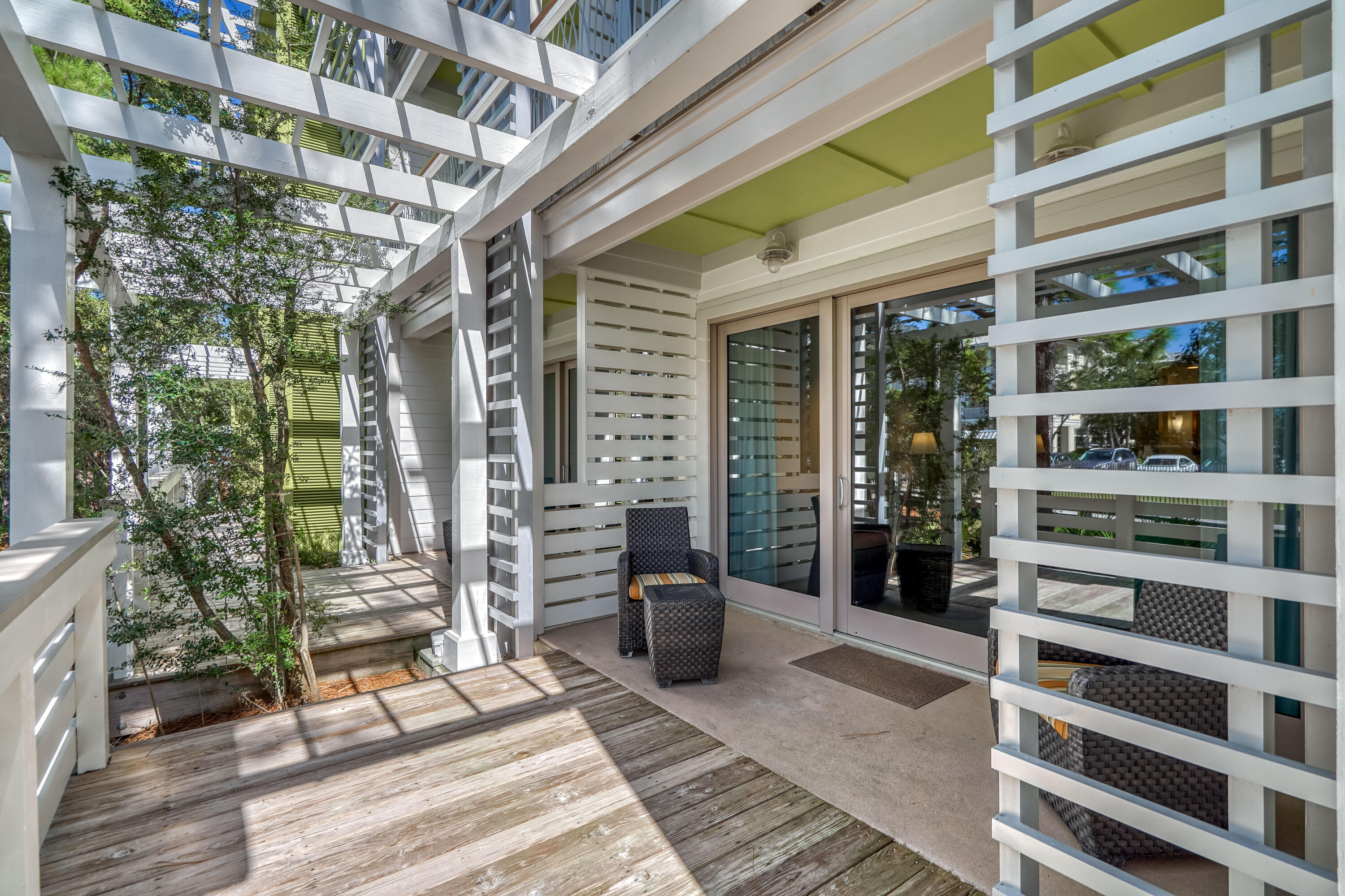 29 Goldenrod Circle, Unit 303/7 Santa Rosa Beach, FL 32459 - Photo 32 of 36 a view of a building with a potted plant and a window