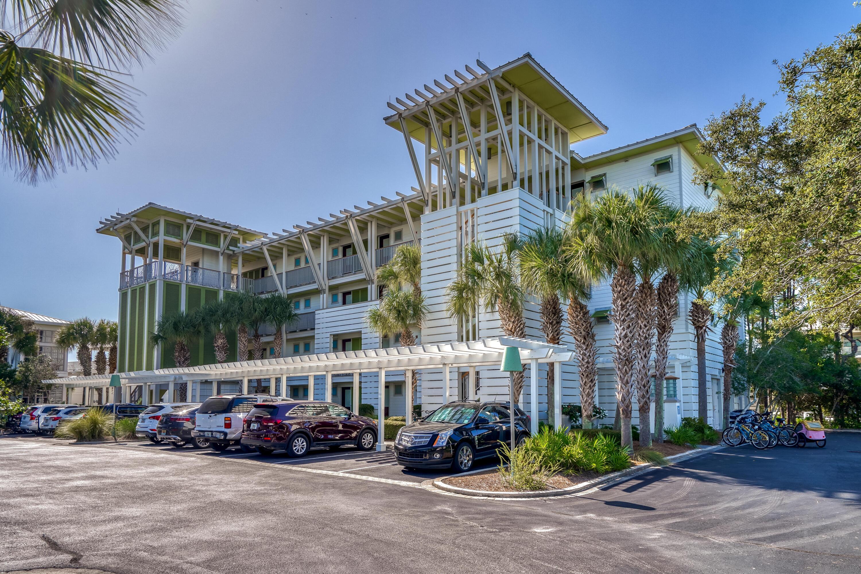 29 Goldenrod Circle, Unit 303/7 Santa Rosa Beach, FL 32459 - Photo 35 of 36 a front view of a building with tree s