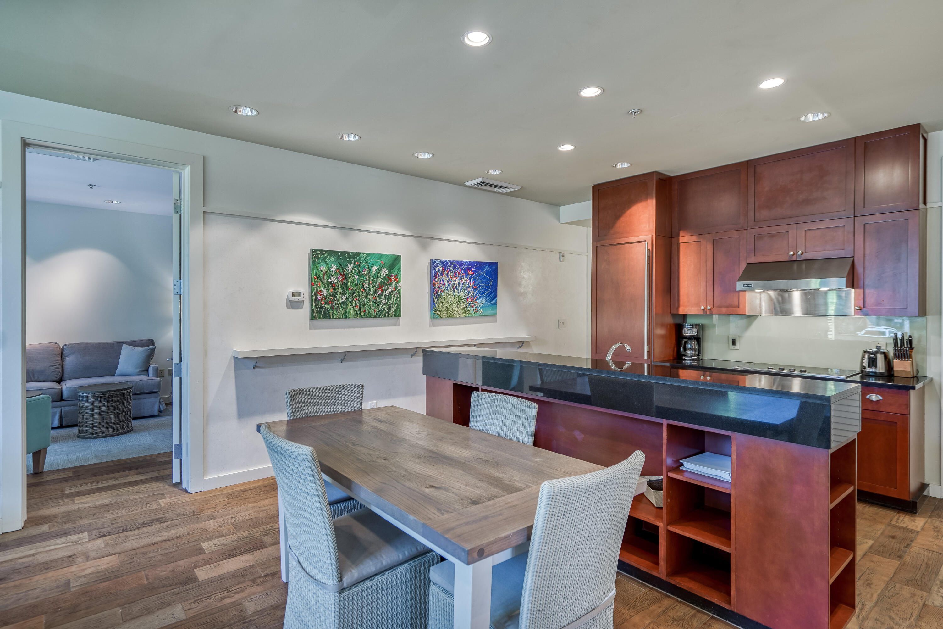 29 Goldenrod Circle, Unit 303/7 Santa Rosa Beach, FL 32459 - Photo 7 of 36 a kitchen with a table and chairs in it