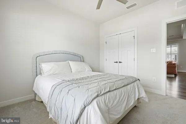 a view of storage and utility room with washer and dryer