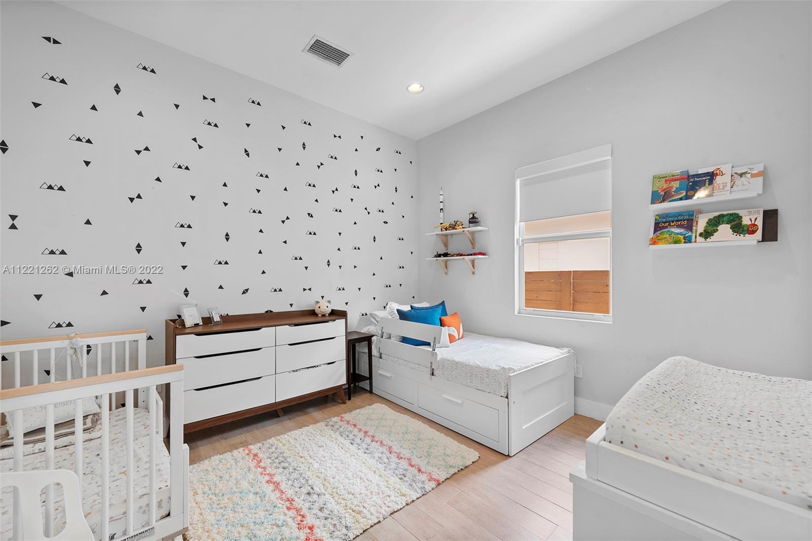 2321 Southwest 19th Street Miami, FL 33145 - Photo 15 of 29 a living room with furniture and baby crib