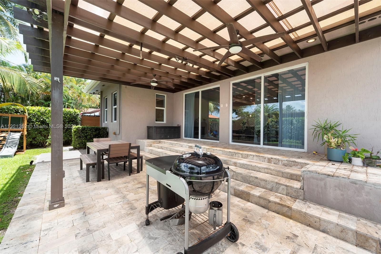 2321 Southwest 19th Street Miami, FL 33145 - Photo 24 of 29 a outdoor living space with furniture and garden view