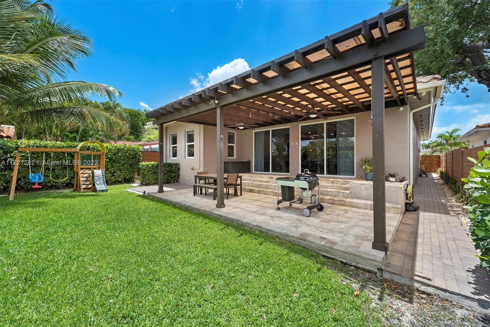 2321 Southwest 19th Street Miami, FL 33145 - Photo 26 of 29 a view of a chair and tables in the patio
