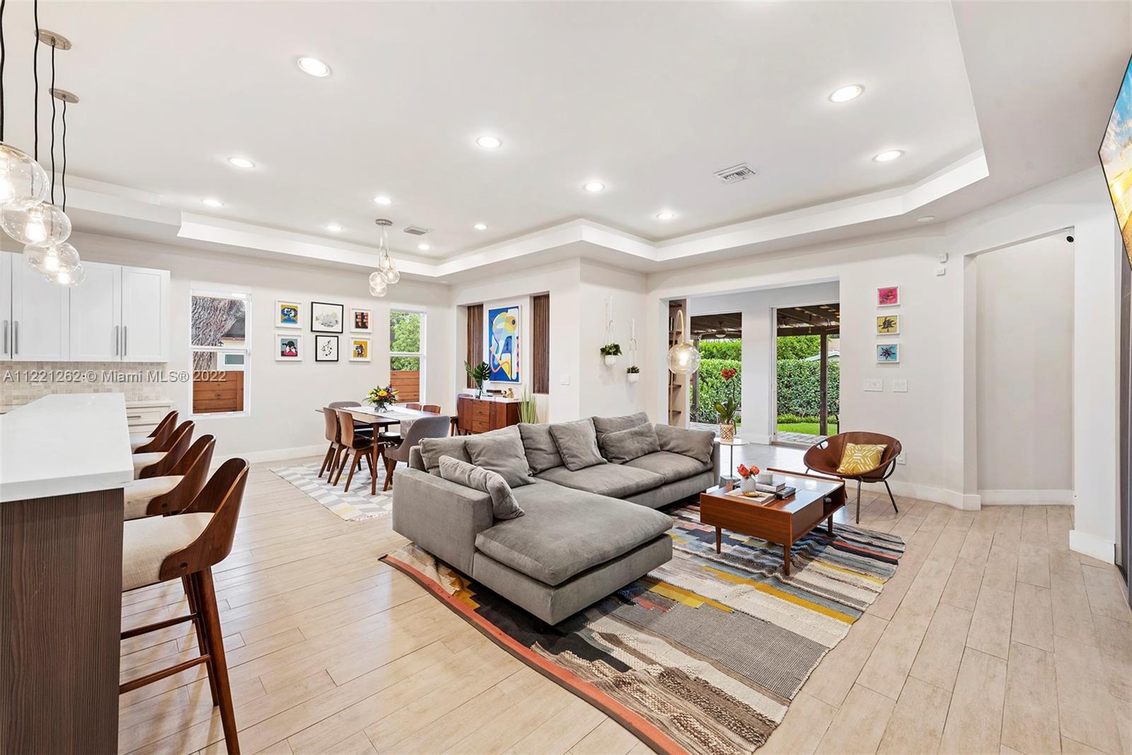2321 Southwest 19th Street Miami, FL 33145 - Photo 3 of 29 a living room with furniture and a wooden floor