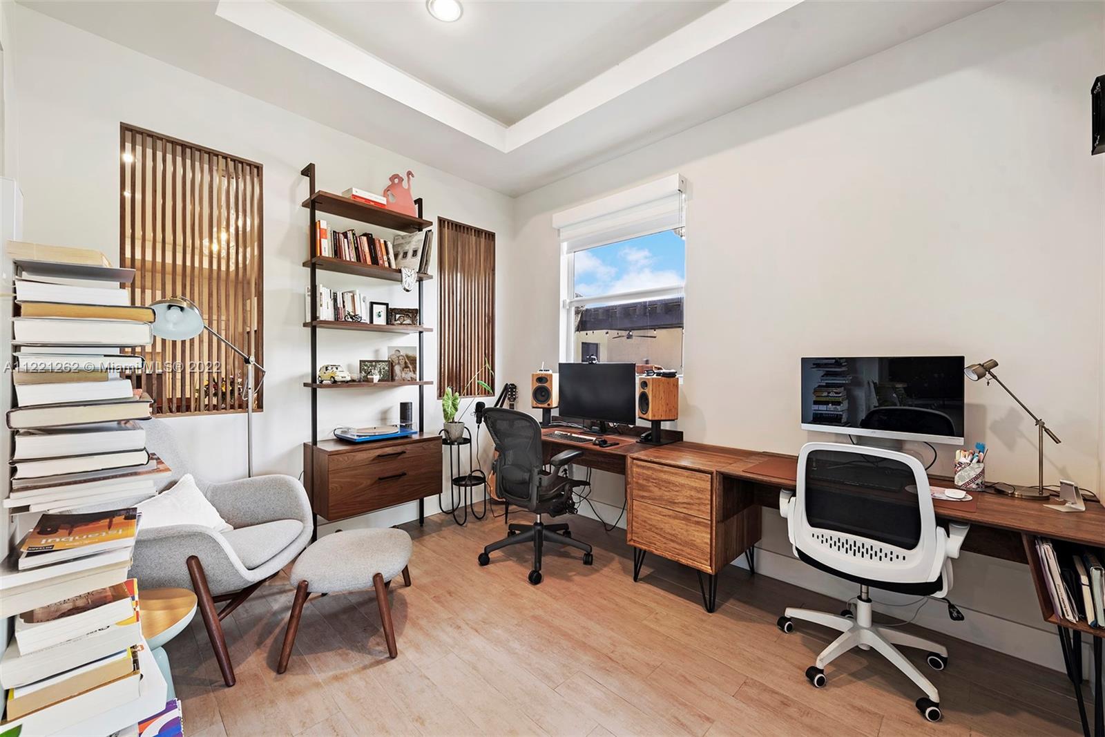 2321 Southwest 19th Street Miami, FL 33145 - Photo 10 of 29 a view of a workspace with furniture and a window