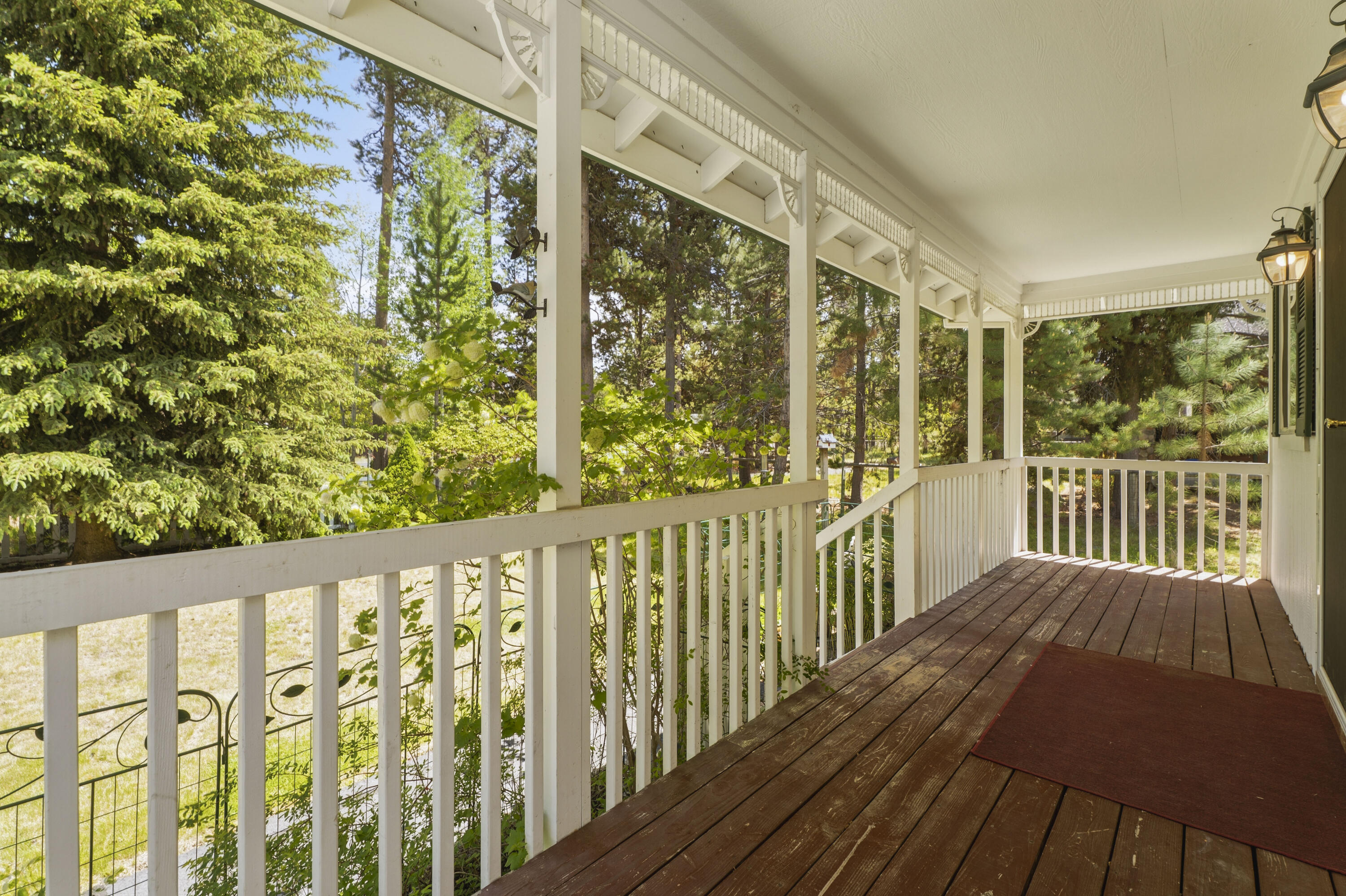 55885 Osprey Road Bend, OR 97707 - Photo 24 of 58 This porch entry would be great for watching wildlife and creating your own personal oasis.