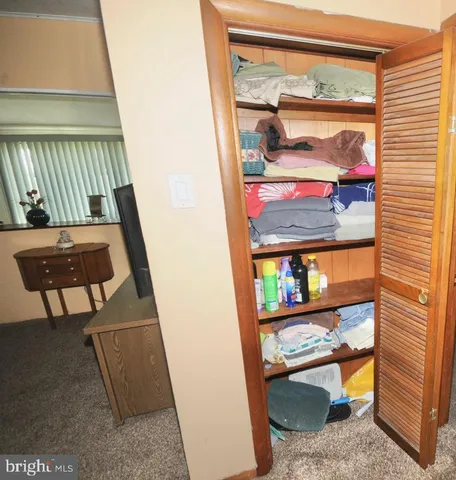 a view of entryway with a front door