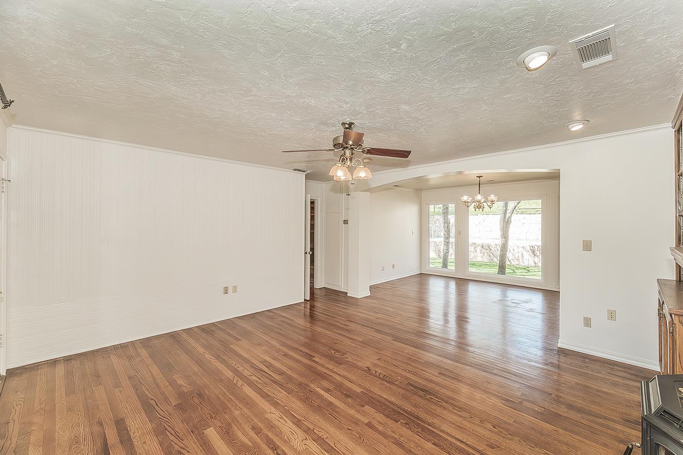 31638 Lodge Road Auberry, CA 93602 - Photo 13 of 90 wooden floor in an empty room with a window