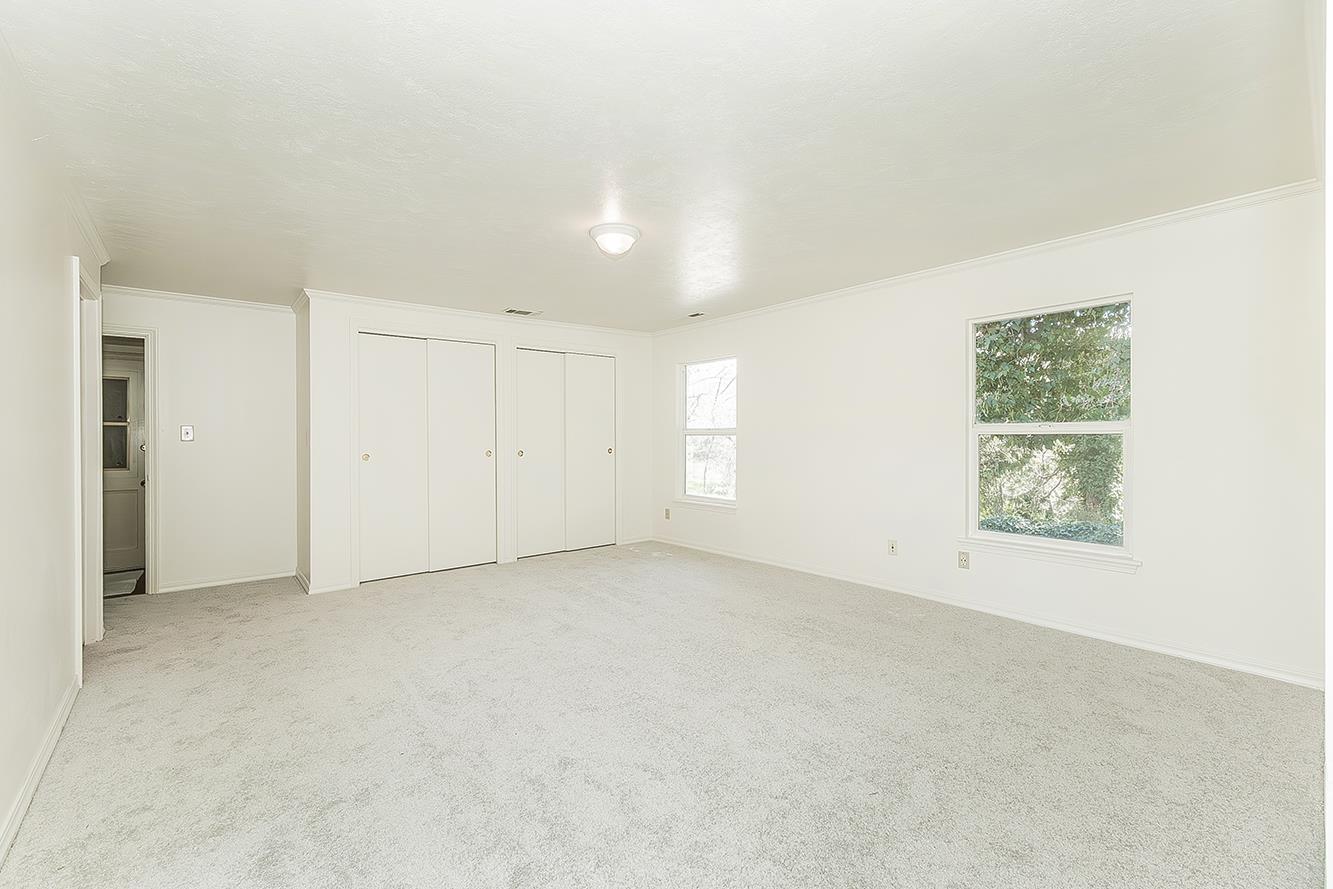 31638 Lodge Road Auberry, CA 93602 - Photo 24 of 90 an empty room with windows and closet