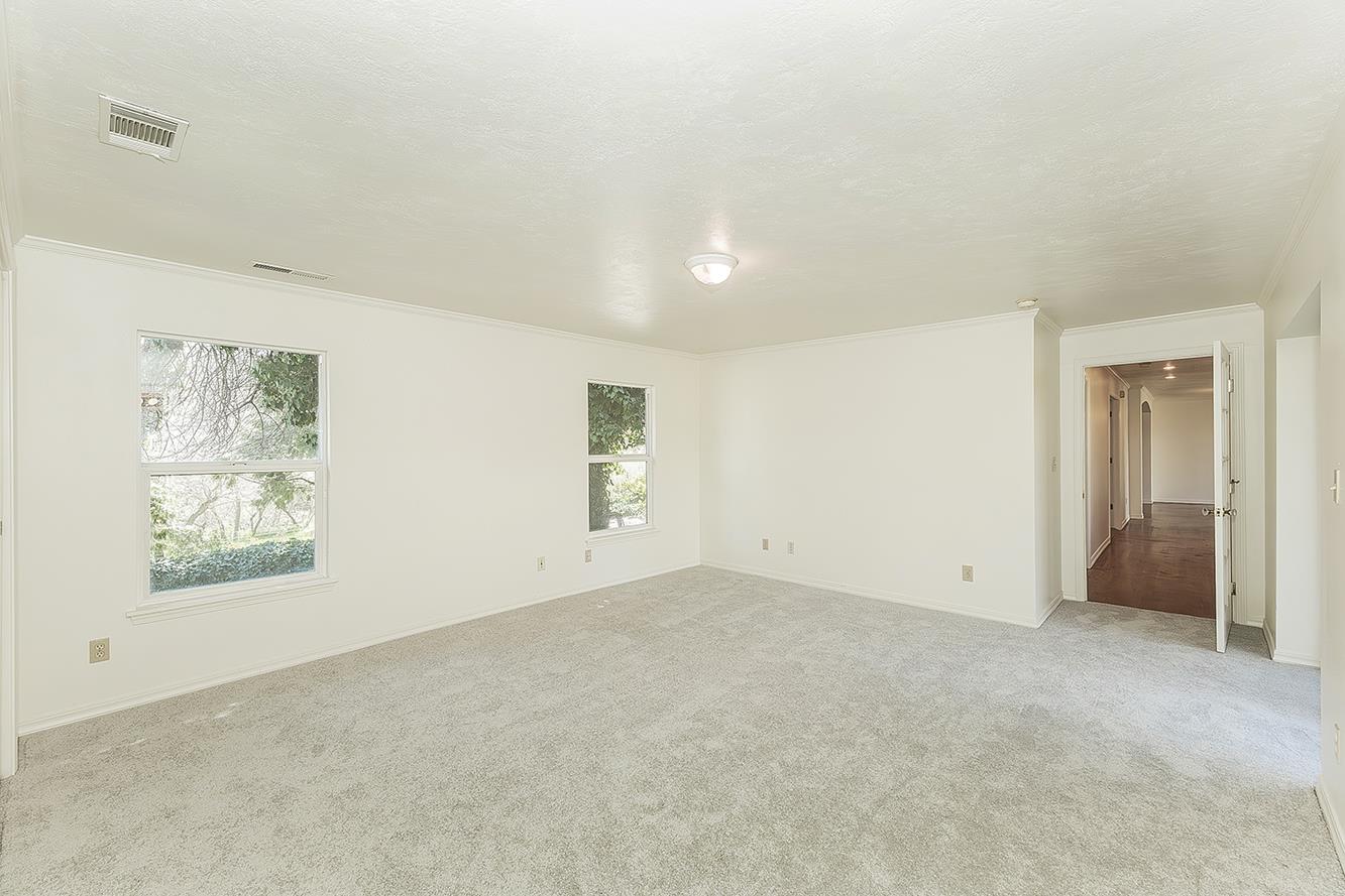 31638 Lodge Road Auberry, CA 93602 - Photo 28 of 90 an empty room with windows