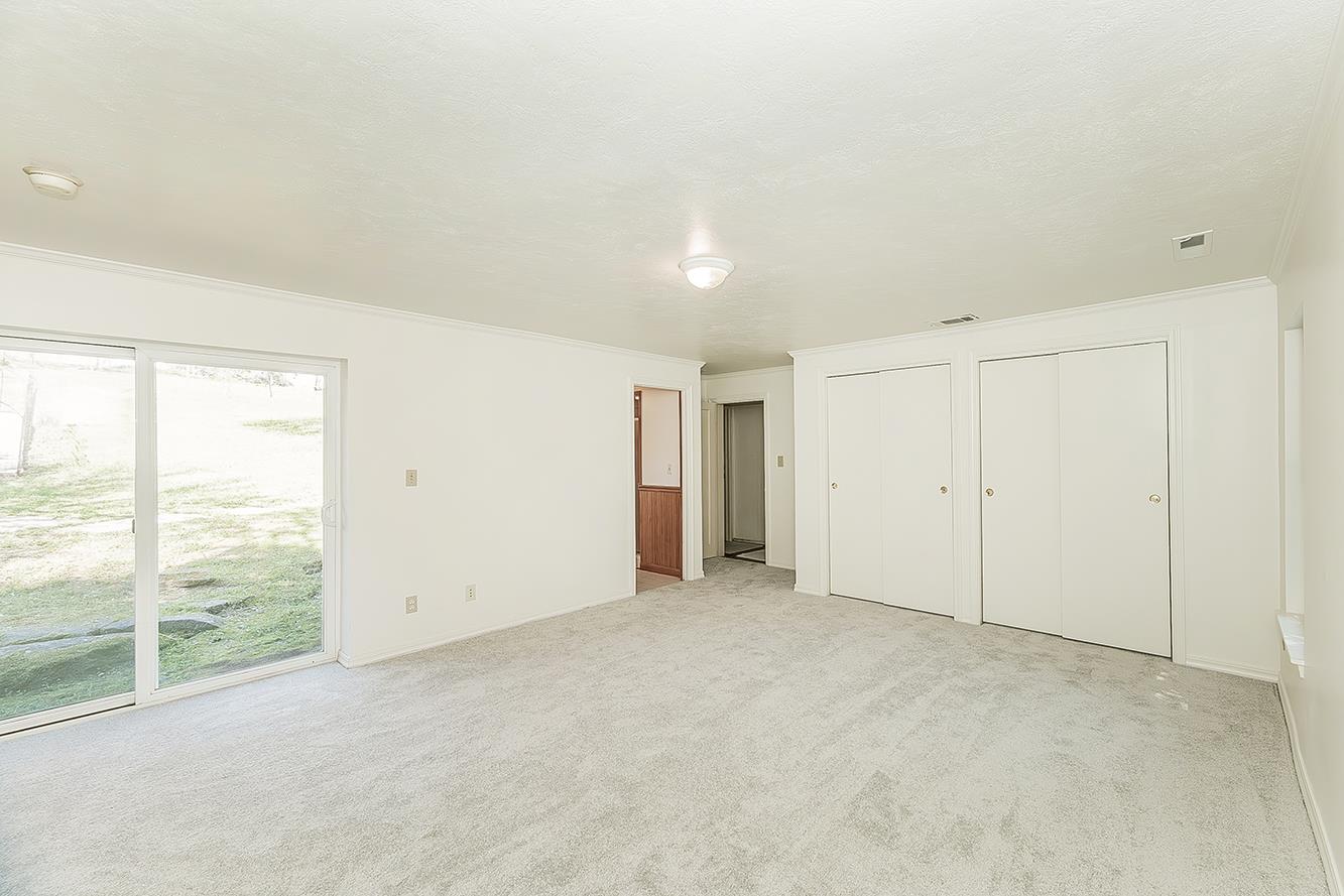 31638 Lodge Road Auberry, CA 93602 - Photo 30 of 90 an empty room with windows