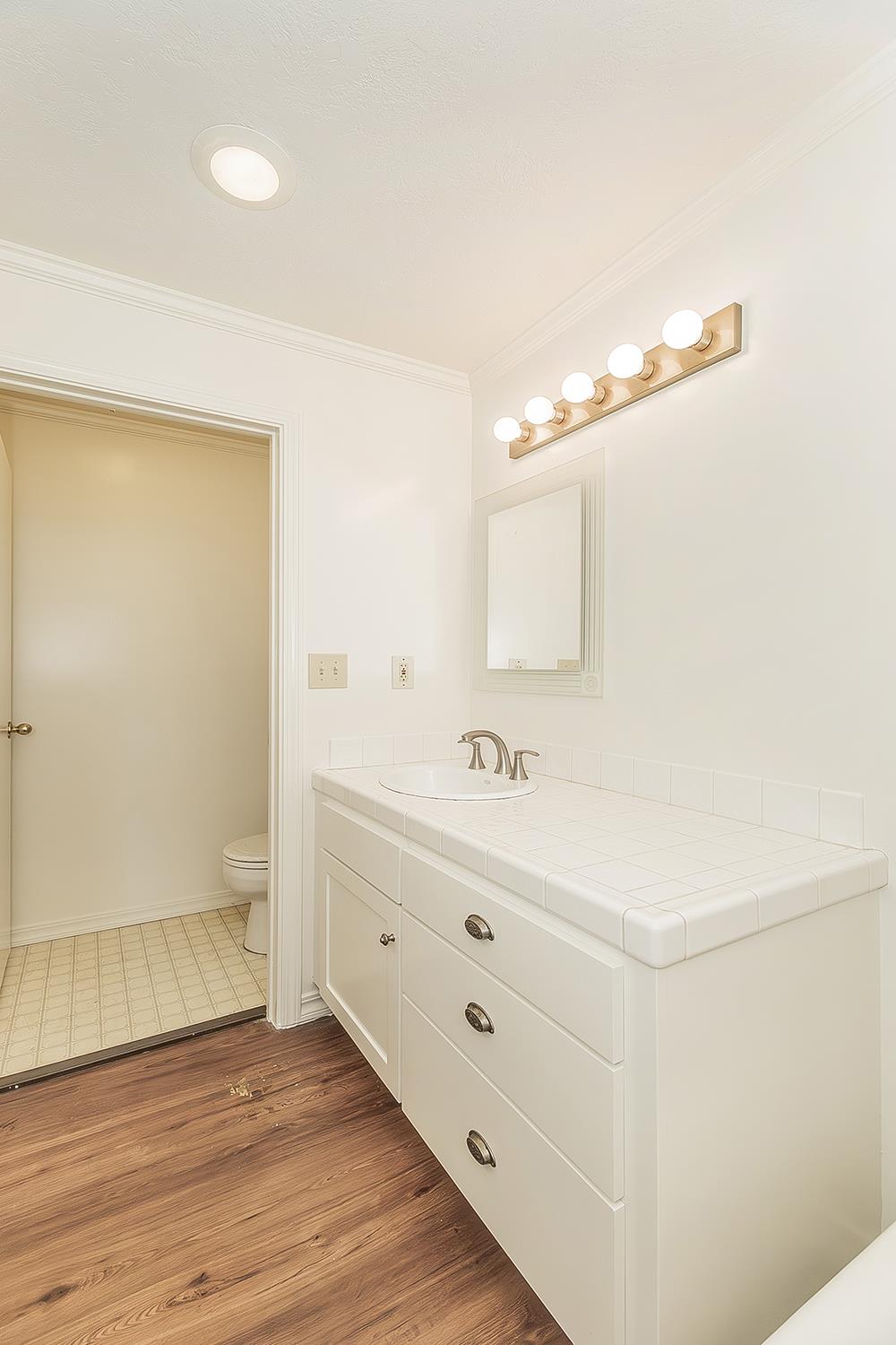 31638 Lodge Road Auberry, CA 93602 - Photo 41 of 90 a bathroom with a sink and a mirror