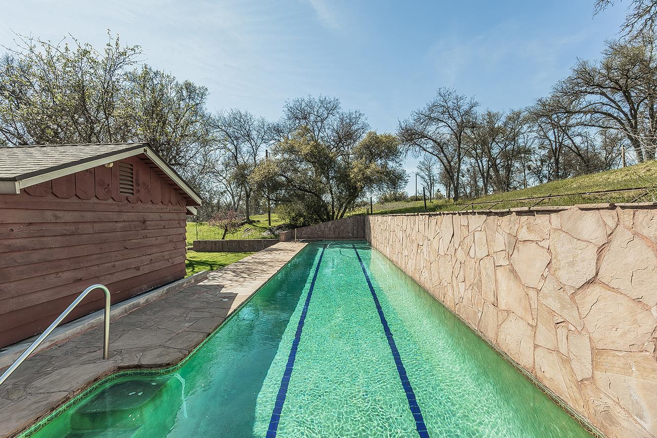 31638 Lodge Road Auberry, CA 93602 - Photo 49 of 90 a view of swimming pool with a backyard