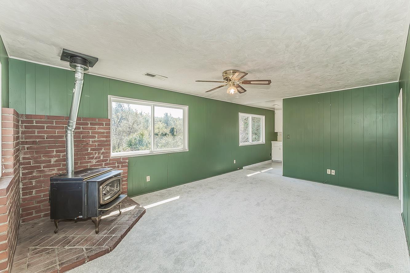 31638 Lodge Road Auberry, CA 93602 - Photo 56 of 90 a view of an empty room with a window