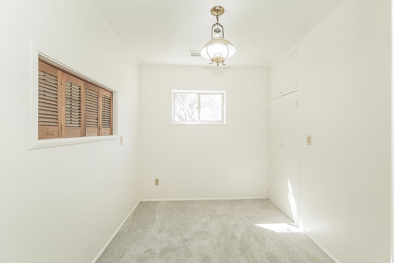 31638 Lodge Road Auberry, CA 93602 - Photo 62 of 90 a view of an empty room with a window
