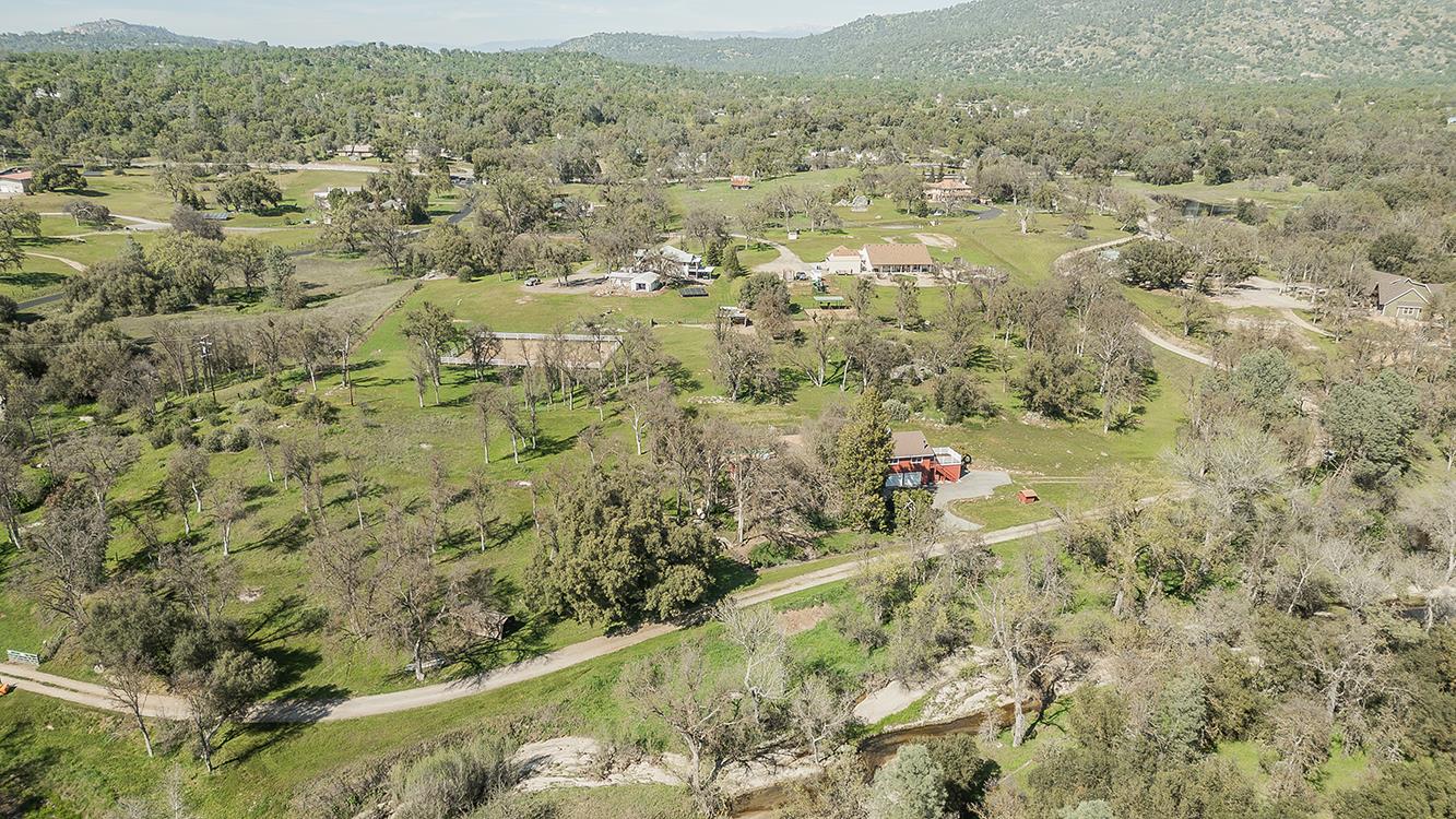 31638 Lodge Road Auberry, CA 93602 - Photo 86 of 90 an aerial view of residential houses with outdoor space