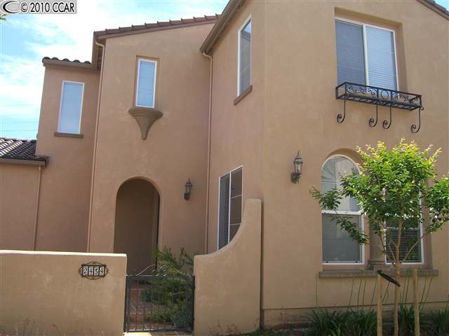 2434 Cedarwood Loop San Ramon, CA 94582 - Photo 1 of 1 a front view of a house with garden