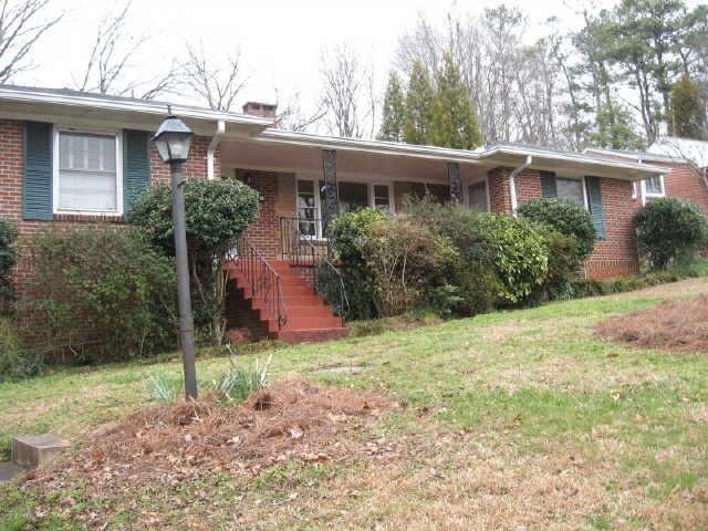 682 North Parkwood Road Decatur, GA 30030 - Photo 1 of 1 a view of a house with backyard and garden
