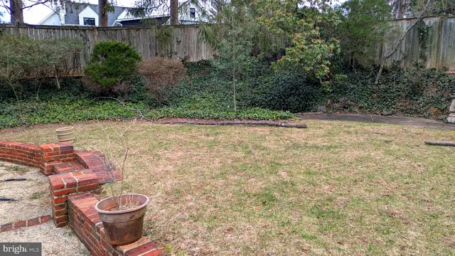 a view of a backyard of a house