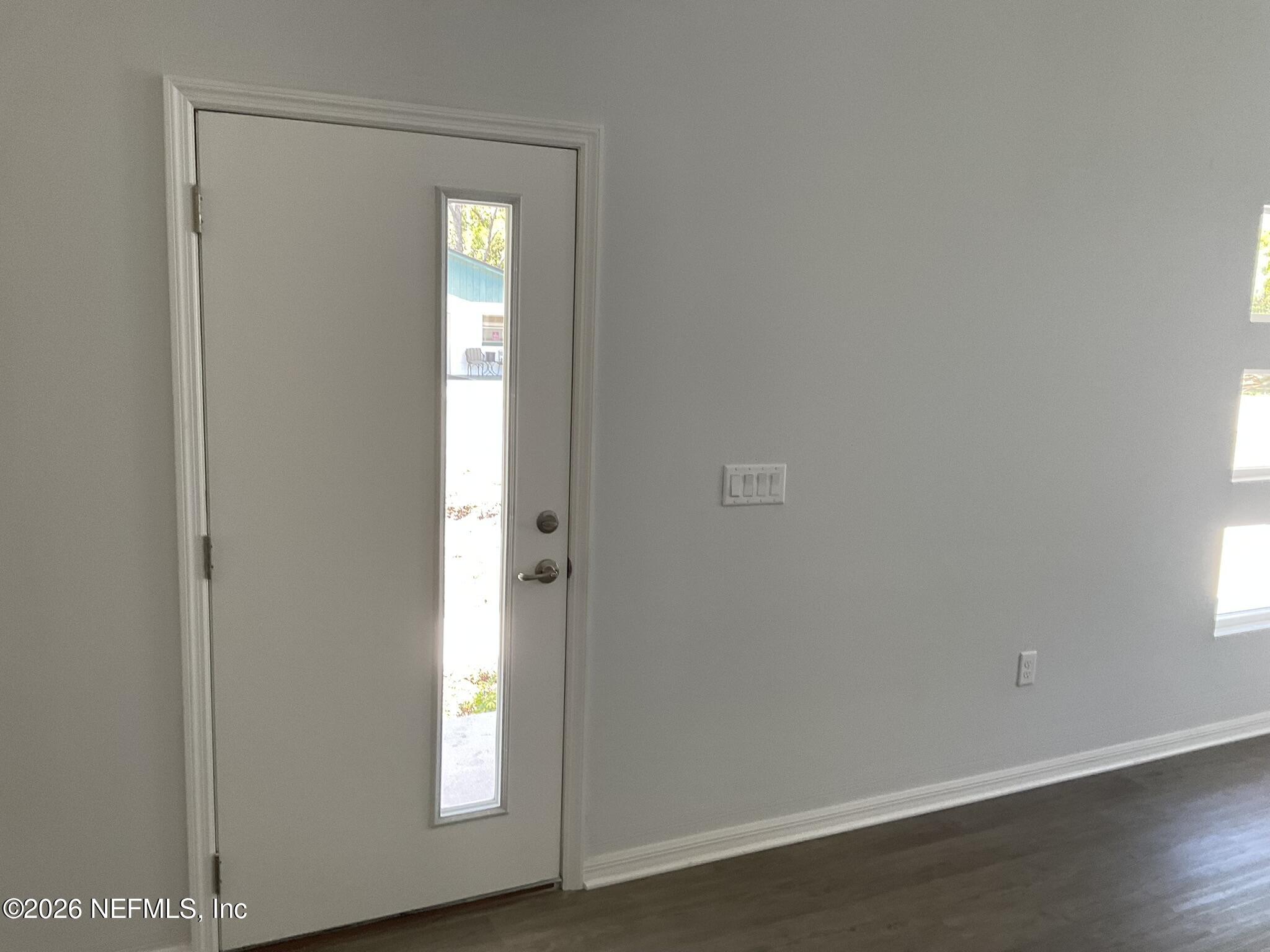 1155 Butler Avenue St. Augustine, FL 32084 - Photo 6 of 36 INTERIOR FRONT DOOR