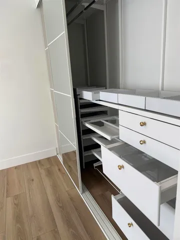 a view of an empty walk in closet