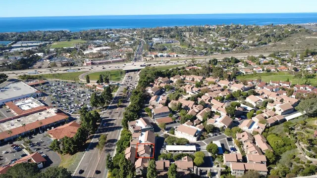 an aerial view of a city with lots of residential buildings