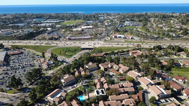 an aerial view of a city with lots of residential buildings