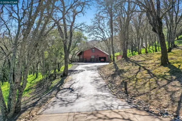 a view of a house with a park