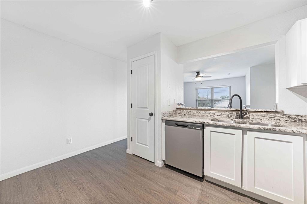 2200 East Trinity Mills Road, Unit 510 Carrollton, TX 75006 - Photo 4 of 17 a bathroom with a sink and a mirror