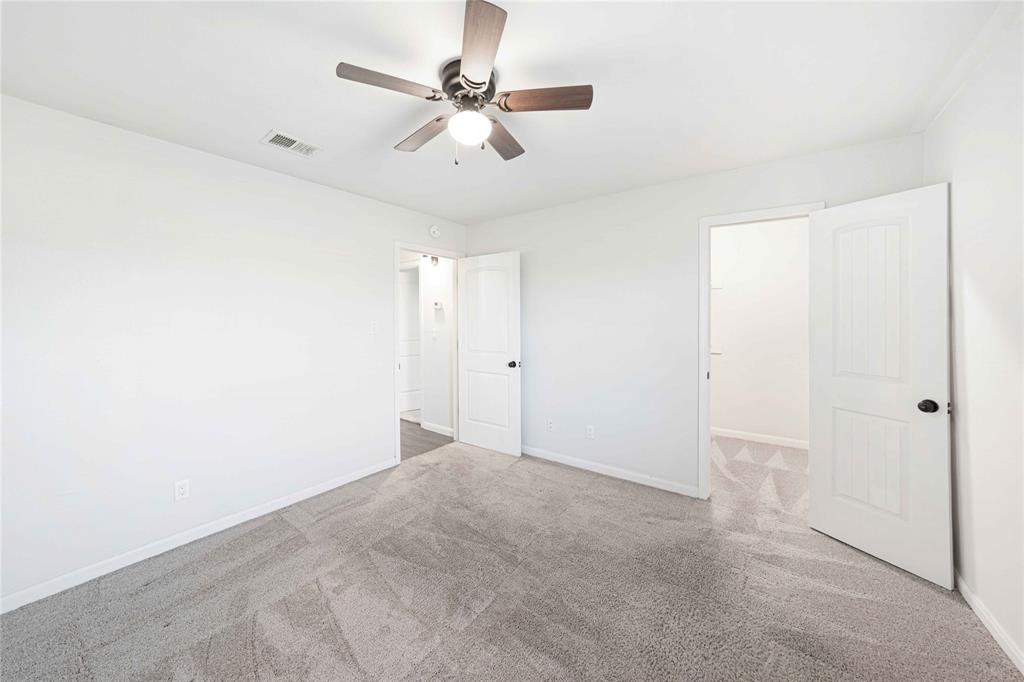 2200 East Trinity Mills Road, Unit 510 Carrollton, TX 75006 - Photo 9 of 17 a view of an empty room