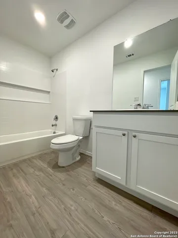 a bathroom with a sink and a toilet
