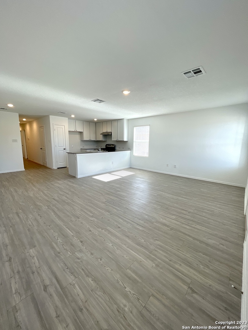 7274 Pasture Run San Antonio, TX 78252 - Photo 4 of 17 a view of a kitchen with a sink and a window