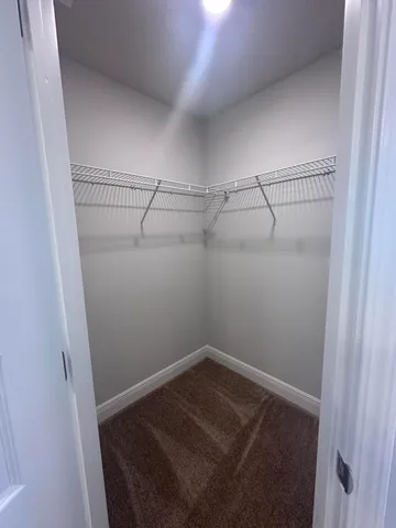 a view of a room with racks on the wall