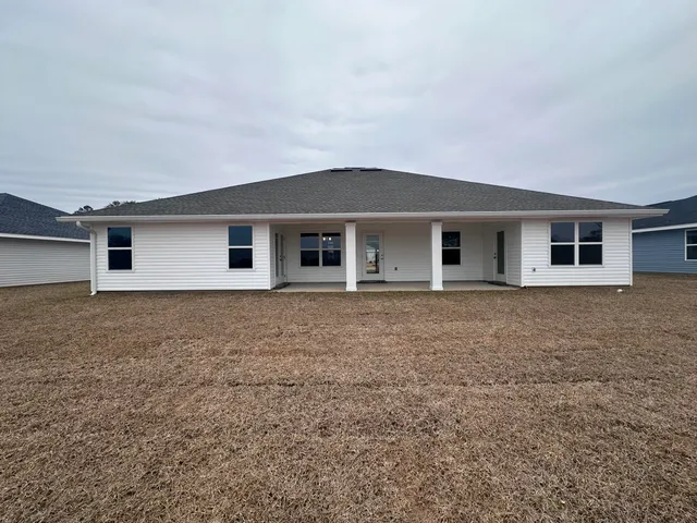 front view of a house with yard